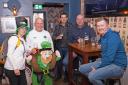 Some of the walkers suitably dressed for St Patrick’s Day preparing for the walk