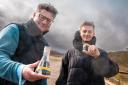 Weardale Lithium’s Stewart Dickson (left) with a sample of the geothermal brine and Watercycle Technologies’ Dr Seb Leaper with the lithium carbonate, on the site in Weardale