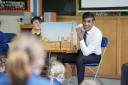 Rishi Sunak talks to pupils at Great Smeaton Academy Primary School about his work in Westminster