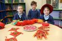 Pupils from Barnard Castle Preparatory School get ready for Chinese New Year as their school opens its doors to young visitors on Saturday, L-R, Harriet Lavery, Jamie Frost and Amelia Tully