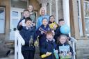 Evie Milbank, back left, with headmistress Laura Turner and children from Barnard Castle Preparatory School with educational resources for children in Africa