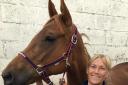 EXPERIENCED: Debbie Tomlinson with her horse Echo. Mrs Tomlinson has been riding since she was six years old