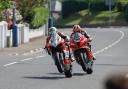 Davey Todd (74) battling with Glenn Irwin (1) at the North West 200