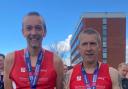 Paul Simpson and Paul Ellis at the end of the Manchester Marathon