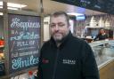 Dundas Indoor Market manager David Harris at one of its traders, Jean's Kitchen