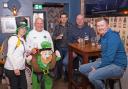 Some of the walkers suitably dressed for St Patrick’s Day preparing for the walk
