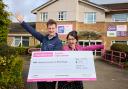 Chris Carlin of Miller Homes presents the cheque to Gemma Young from Henshaws