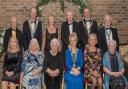 Front, Helen Ison, Joan Phillips, Baroness Harris of Richmond, president Emma Biggs, Cllr Amanda Eames, and Anne Myers. Back, president elect David Ison, district governor David Phillips, Judy Moorhouse, Dean Biggs, Mayor Phil Eames, and Danny Myers