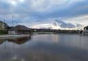 Looking across the lake at Coatham to The Boathouse