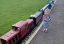 Lily Turnbull with the new miniature train, The James Cook