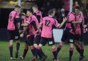 ALL SMILES: Stephen Thompson, second left, is congratulated by his team-mates after scoring against Kendal