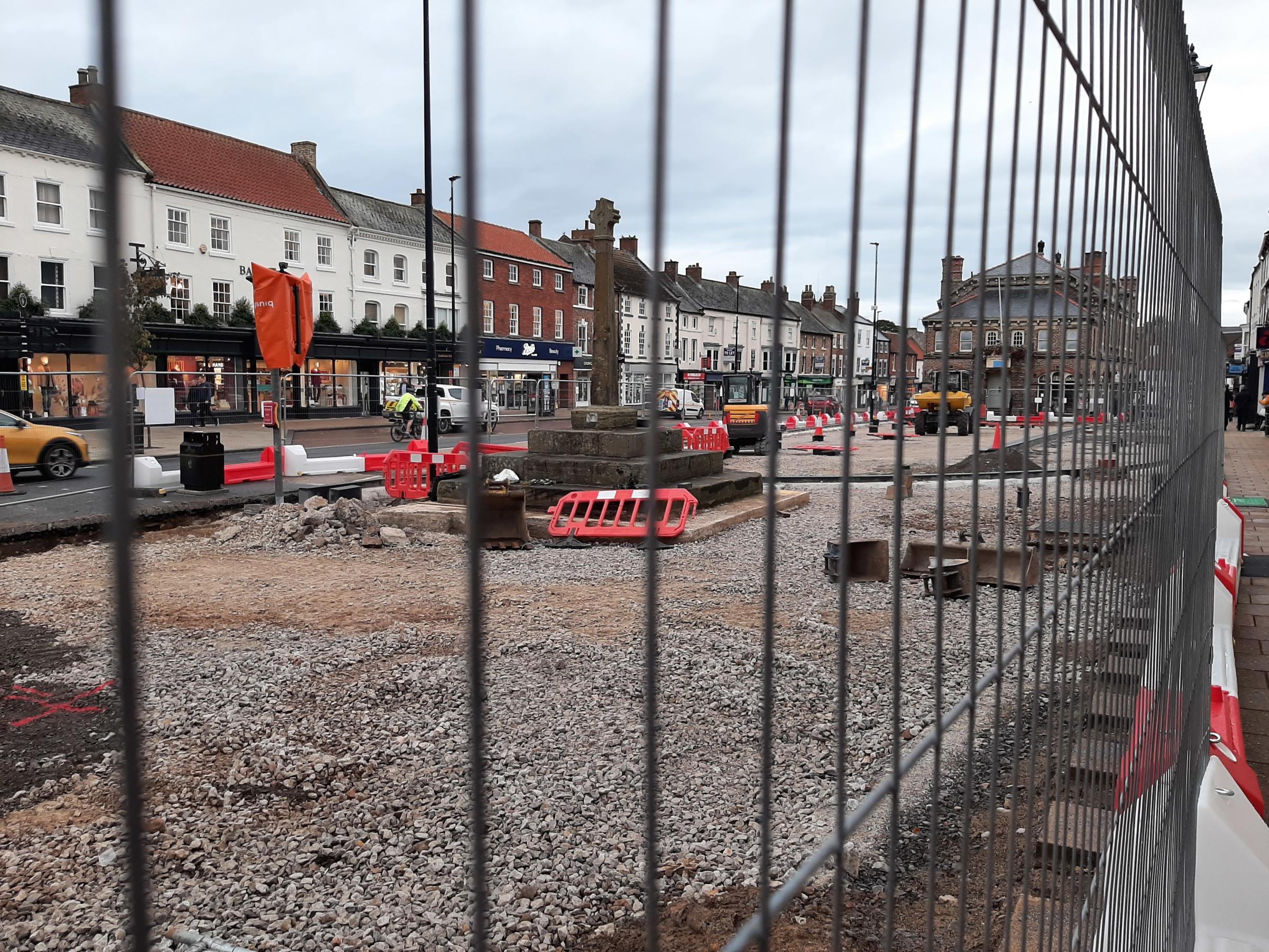A large section of Northallerton High Street remains fenced off while redevelopment work is carried out