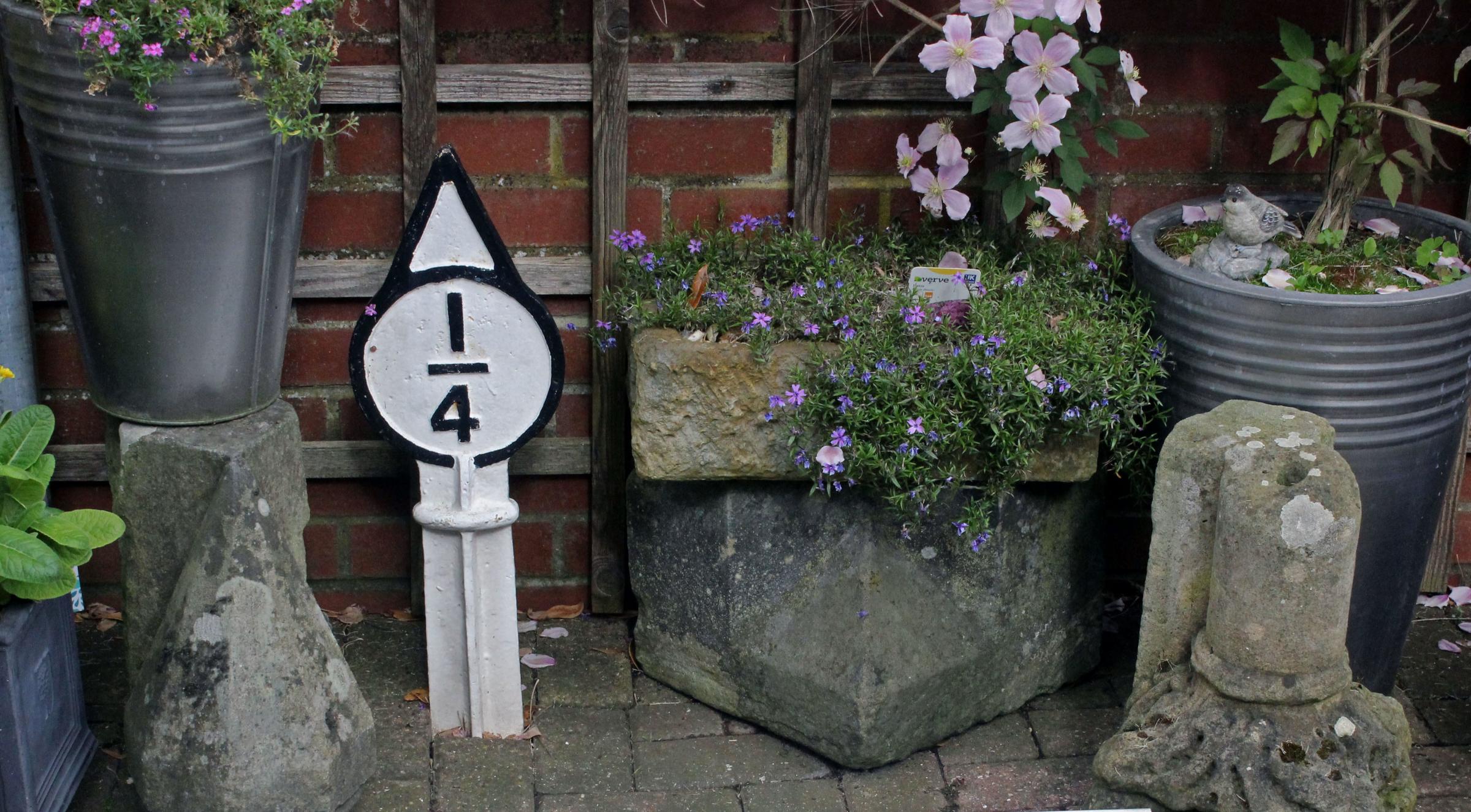 The south Northallerton quarter-of-a-milepost is now in a garden in Darlington
