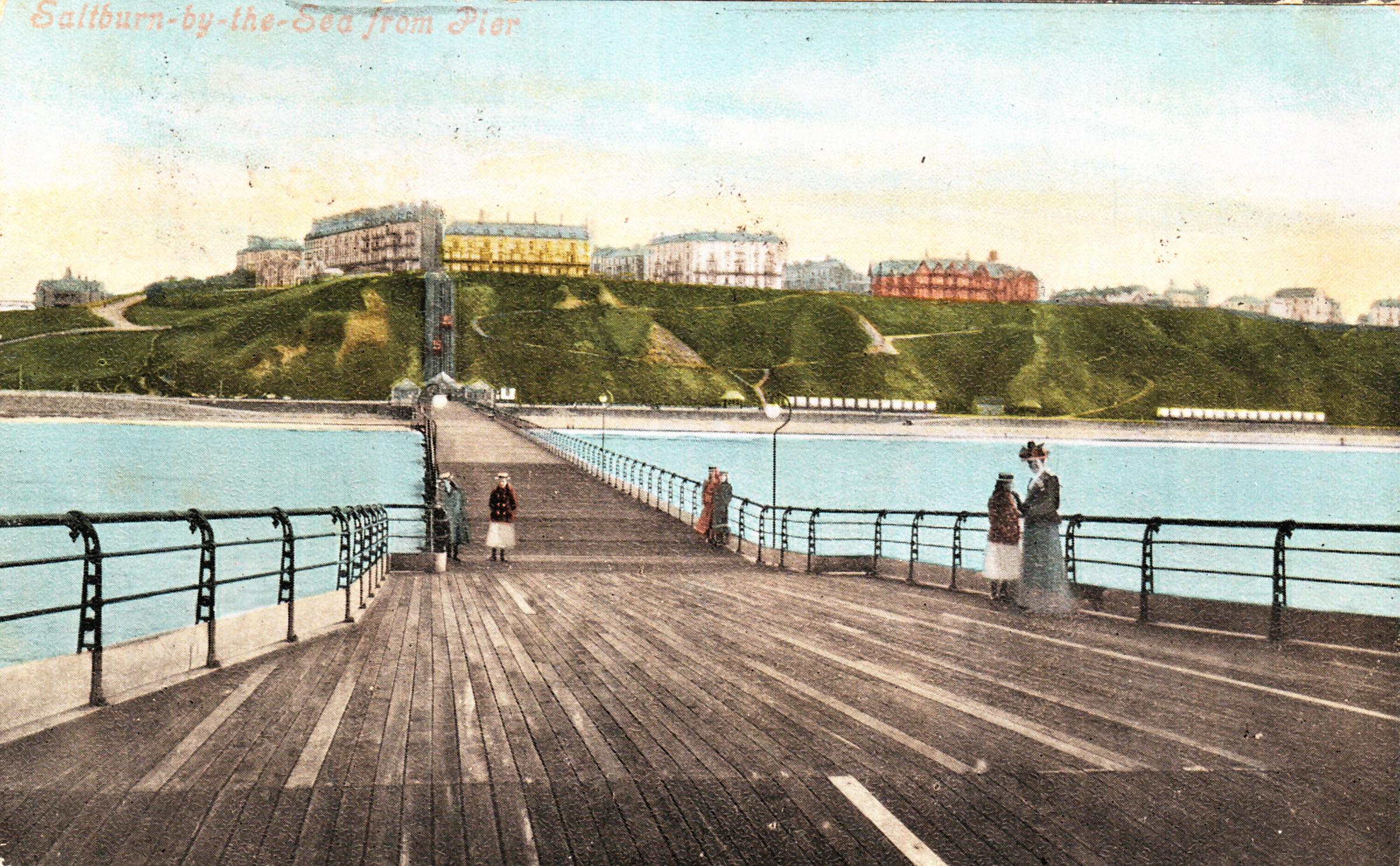 An Edwardian postcard view from Saltburn pierhead to the town..