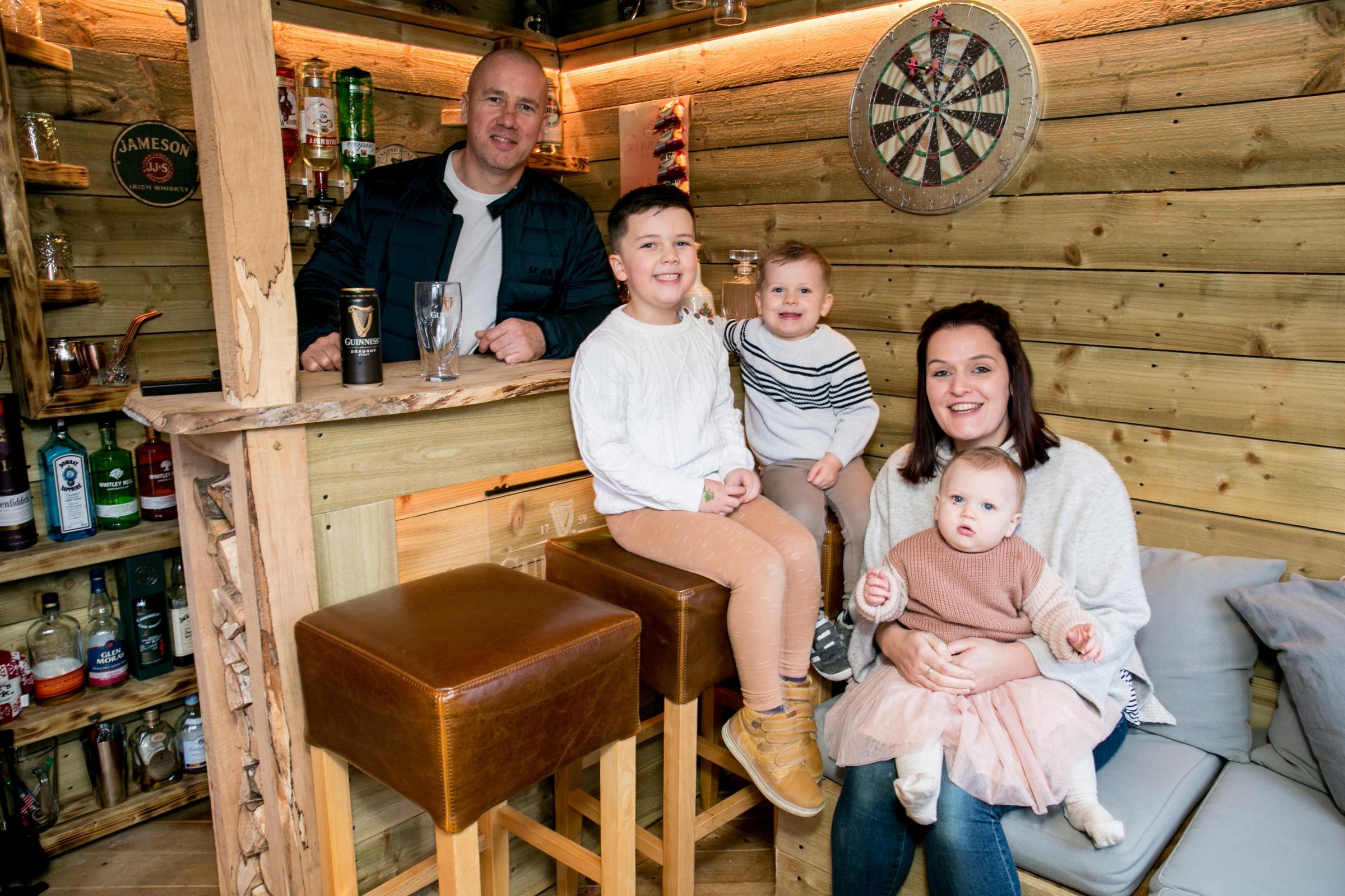 Shaun O’Sullivans shed came runner up in the Shed of the Year competition he is pictured with his family Alison, Orla 1, Jaxon 3 and Colby 5 Picture: SARAH CALDECOTT