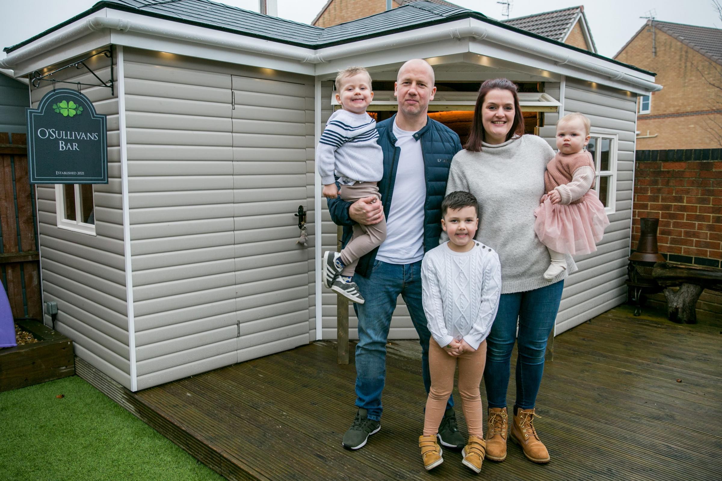 Shaun O’Sullivans shed came runner up in the Shed of the Year competition he is pictured with his wife, Alison, and their children Orla, one, Jaxon, three, and Colby, five Picture: SARAH CALDECOTT