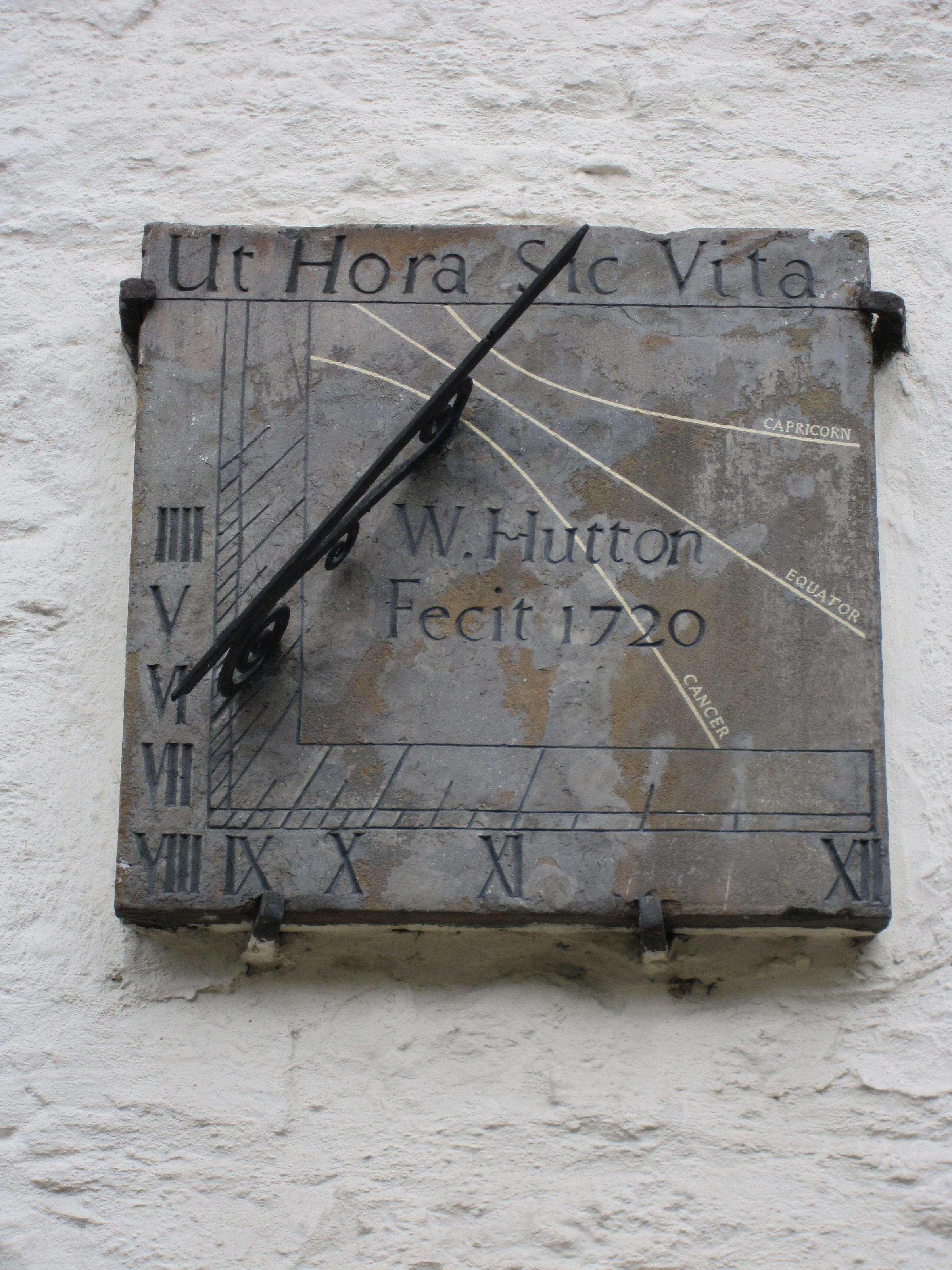 The east face, only telling the time until noon, of the rare double sundial on Richmond Green
