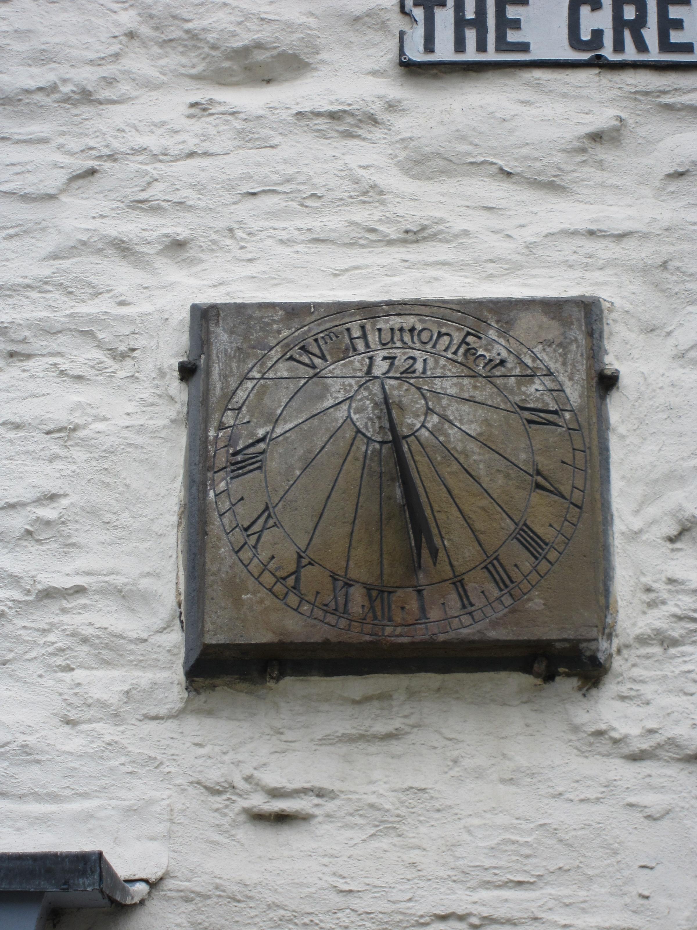 The south face of the rare double sundial on Richmond Green