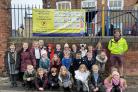 Twenty-Four pupils from Poppleton Road Primary School and Ward Councillor Kallum Taylor pictured next to the school’s banner