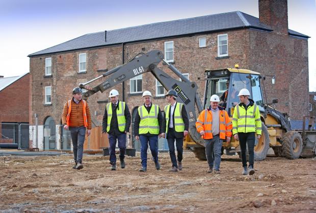 Darlington and Stockton Times: Tom Barker, of Moody Construction; Jonathan Stubbs of Wykeland Group; Hambleton District Council Leader, Councillor Mark Robson; and James Moody, Colin Hall and Scott Wardman, all of Moody Construction at the Treadmills Site