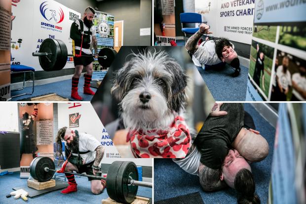 Wounded Army Veteran Mark Tonneron his 24 hour deadlift challenge at the Veterans Hub in Newton Aycliffe, and one of his many supporters Pictures: SARAH CALDECOTT