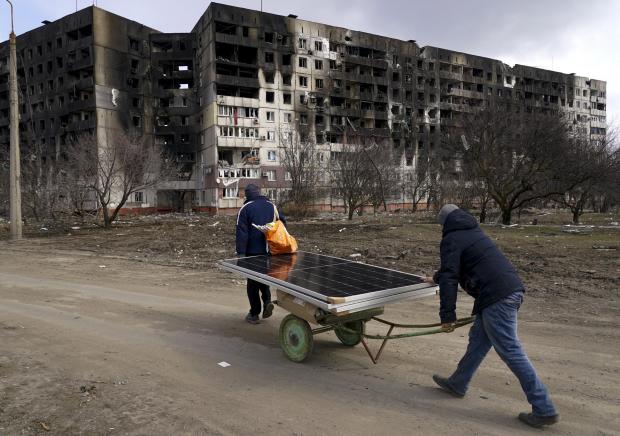 Darlington and Stockton Times: MARIUPOL, UKRAINE - MARCH 20: Civilians trapped in Mariupol city under Russian attacks, are evacuated in groups under the control of pro-Russian separatists, through other cities, in Mariupol, Ukraine on March 20, 2022. (Photo by Stringer/Anadolu Agency