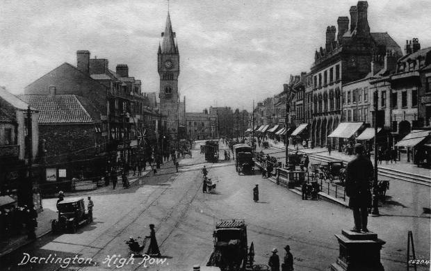 Darlington and Stockton Times: Looking south down High Row over the head of the Pease statue from the first floor dancehall windows of the Sun Inn which occupied the Prospect Place corner until the Midland bank (now HSBC) was built in the mid 1920s