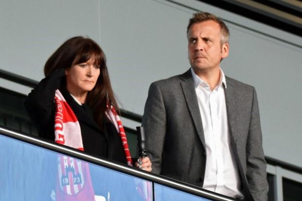 Guisborough Town Chairman Andy Willis with his wife Cath at the recent North Riding Senior Cup Final which the Priorymen reached at York City’s ground to cap off a season of good progress all round