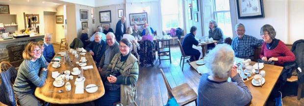 Darlington and Stockton Times: Members of the Darlington and Teesdale Naturalists' Field Club enjoy a hearty breakfast at the High Force Hotel, just as their predecessors had 125 years earlier