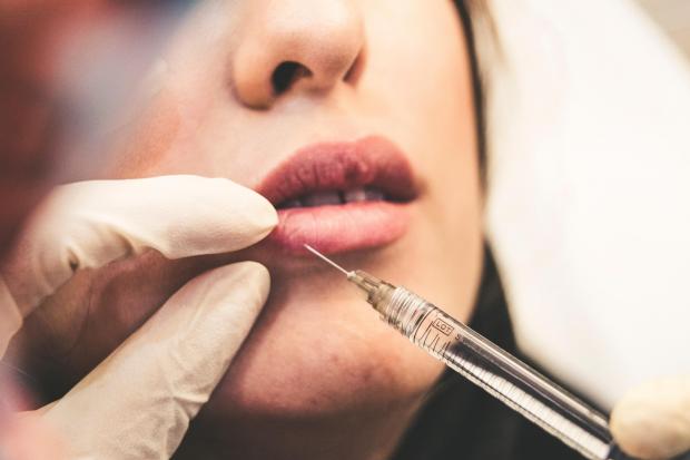 Botox has been raised in a council report on age-restricted products. Picture: Sam Moghadam Khamseh/Unsplash.