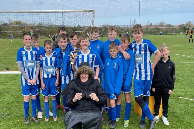 John Kelly, 90, with the Redcar Town Under-12 Blues football team