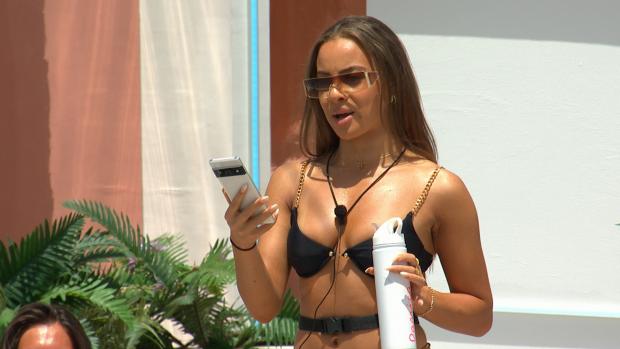 Darlington and Stockton Times: Danica gets a text as Love Island continues tonight at 9pm on ITV2 and ITV Hub. Episodes are available the following morning on BritBox. Credit: ITV