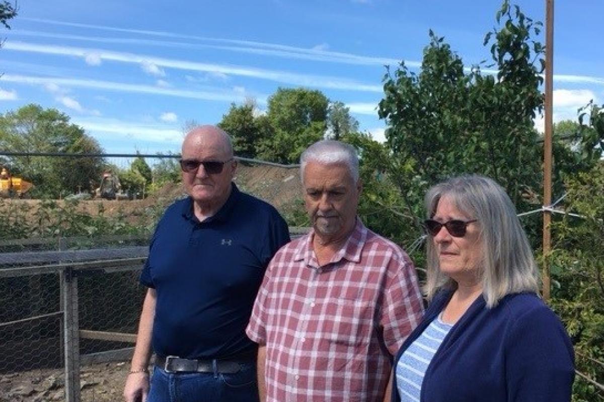 Dave Brown with Mags and Bob Frazer. Their homes are overshadowed by the Taylor Wimpey workings at Aiskew, Bedale
