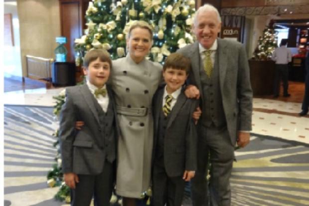 Harry and Helen Gration, and their sons Harrison and Harvey, pictured in 2015 when Harry received the MBE