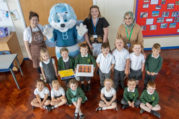 Ashleigh Wood and Beatrice the Bee presented schoolboy Ethan Birch and his class with cupcakes and a certificate, alongside baker Shannon Hart from the Wynyard Cake Company