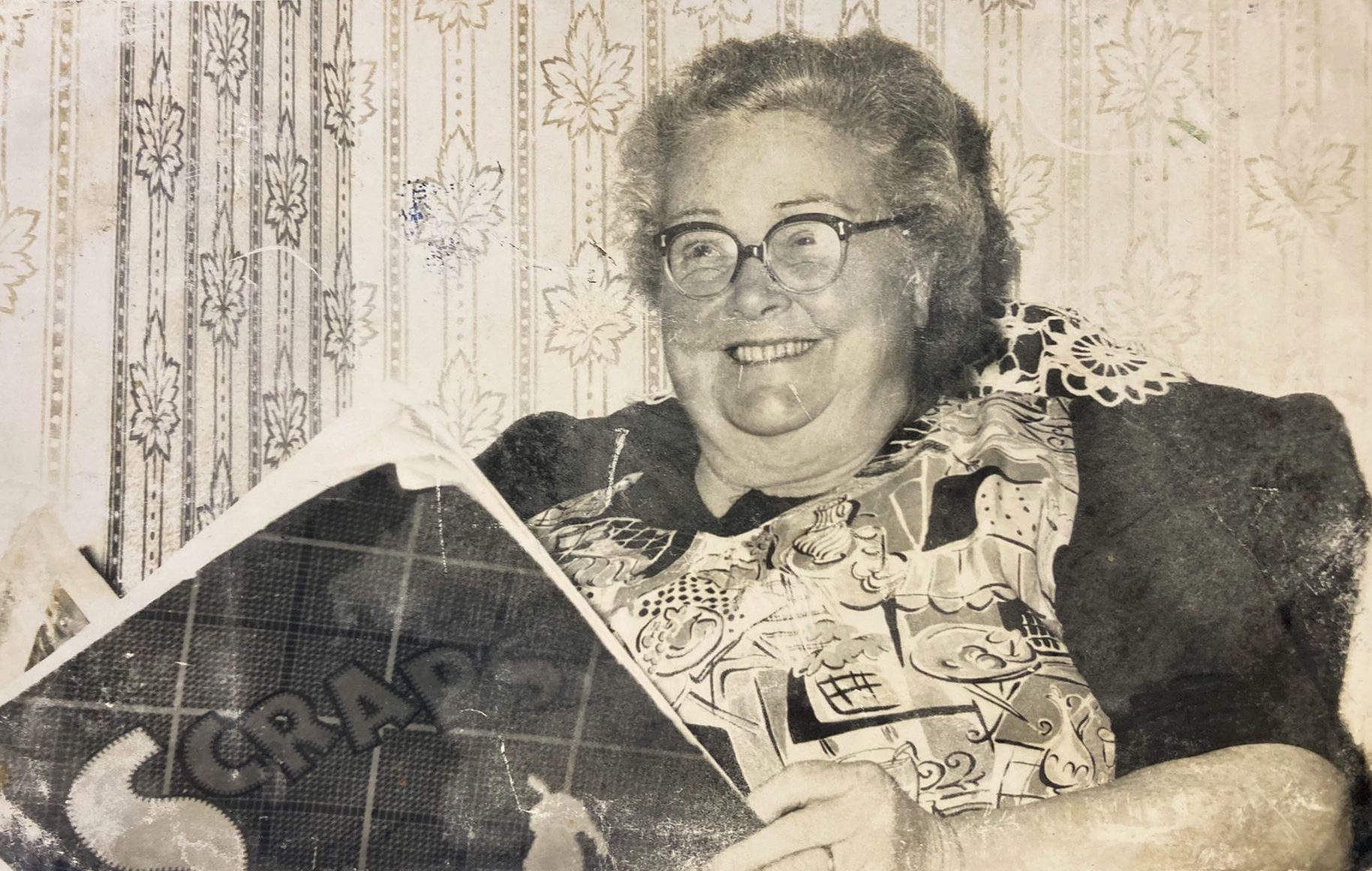 Lillie Galloway, pictured with the scrapbook which is now in the possession of her great-grand-daughters