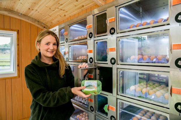 Darlington and Stockton Times: Beth Phalp with the egg vending machine Picture: SARAH CALDECOTT