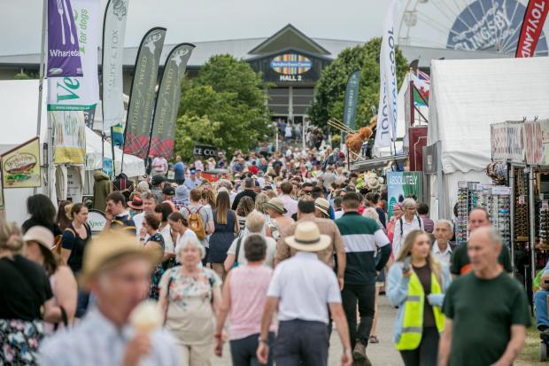 Darlington and Stockton Times: Crowds of people flock to the opening day of The Great Yorkshire Show. Picture: SARAH CALDECOTT