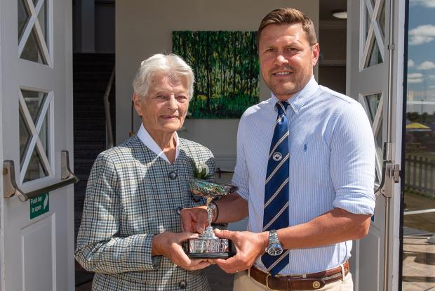Darlington and Stockton Times: Tye Trophy winner Jamie Wood of Pendwick Farm, Alnwick presented by President Margaret Chapman. Picture: GYS