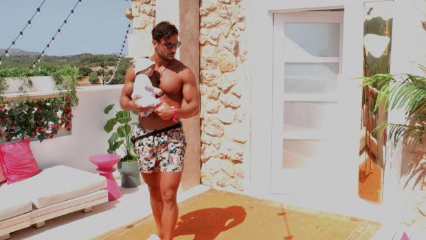 Darlington and Stockton Times: Davide on the terrace during the baby challenge. Love Island continues tomorrow at 9pm on ITV2 and ITV Hub. Episodes are available the following morning on BritBox. Credit: ITV