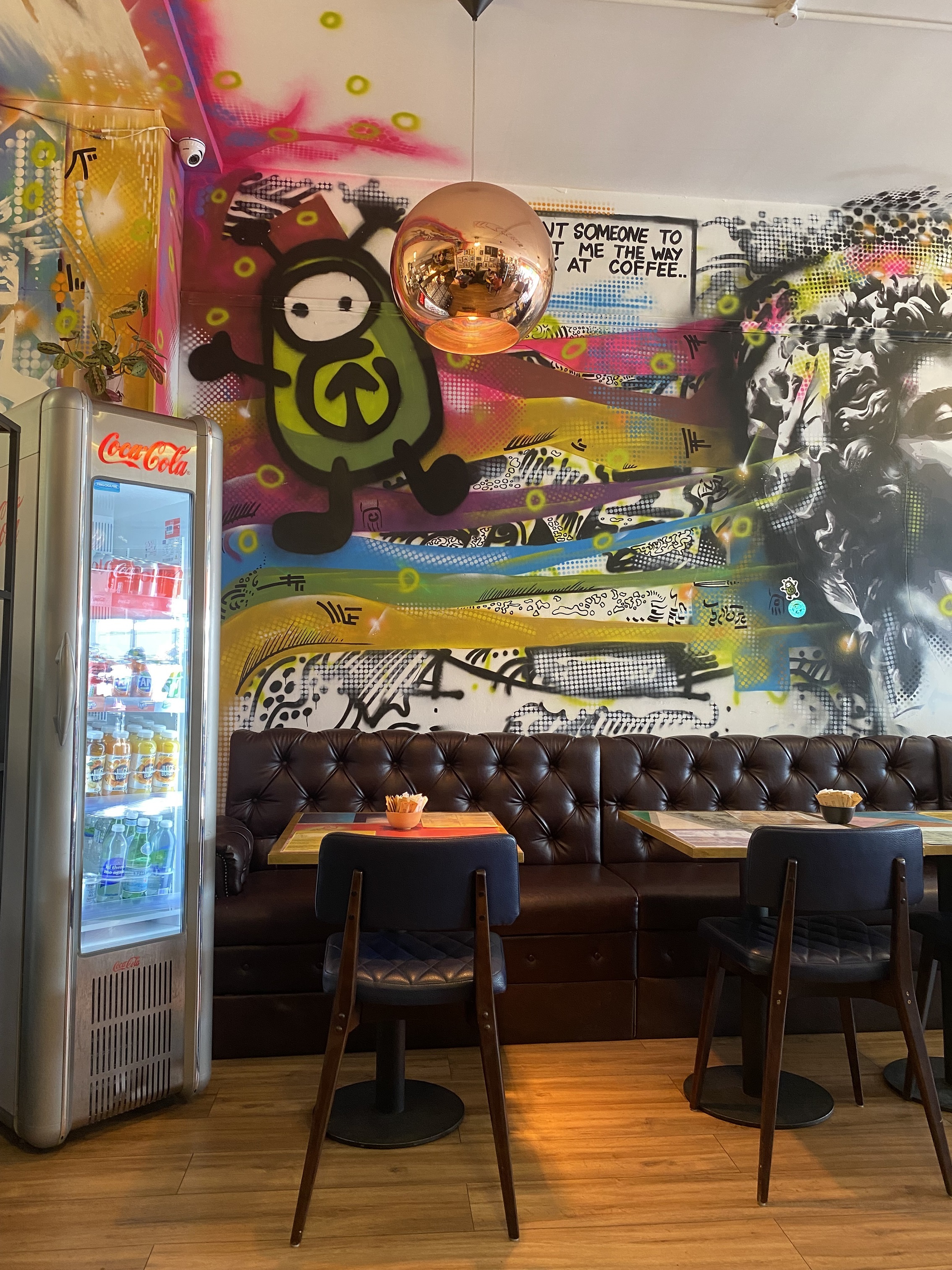 Striking murals on the walls of 1Twenty7 Café and Open Kitchen in Northallerton