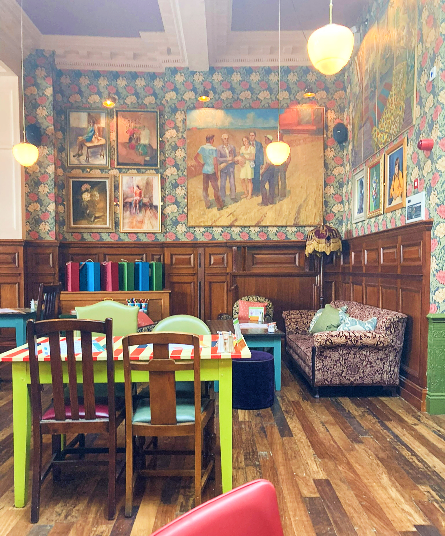 A glimpse inside the Morro Lounge with a riot of colours and artworks in the old bank chamber