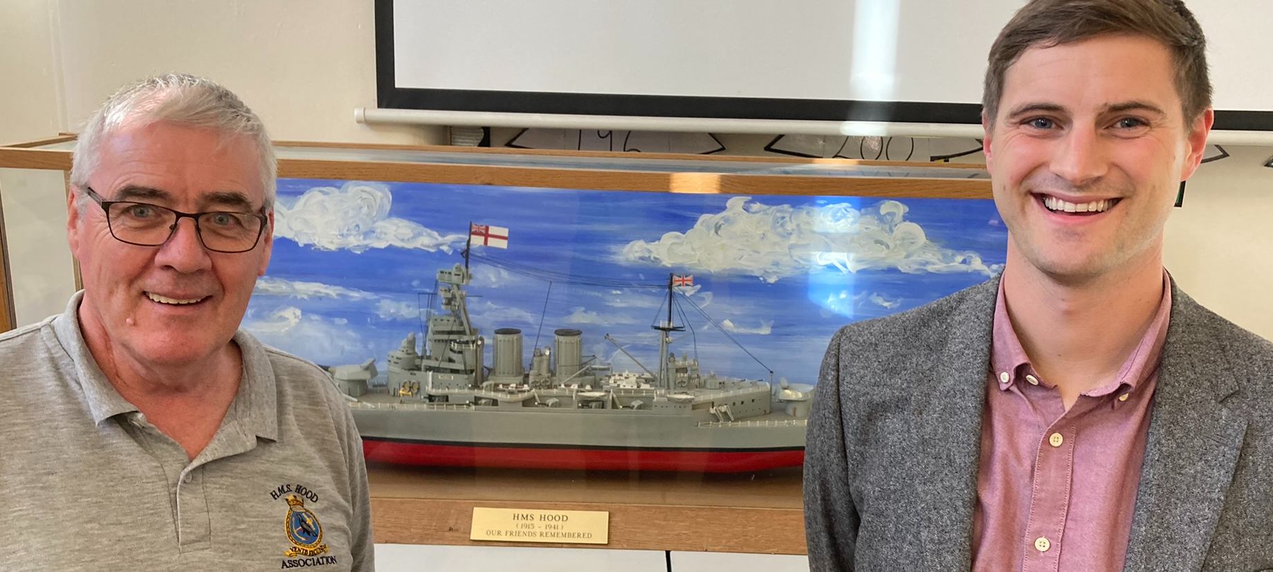 Barry Roberts, chairman of the HMS Hood Association, and Applegarth headteacher Justin Peoples with the schools large model of the battlecruiser which was made in 2006 to commemorate the 65th anniversary of the sinking