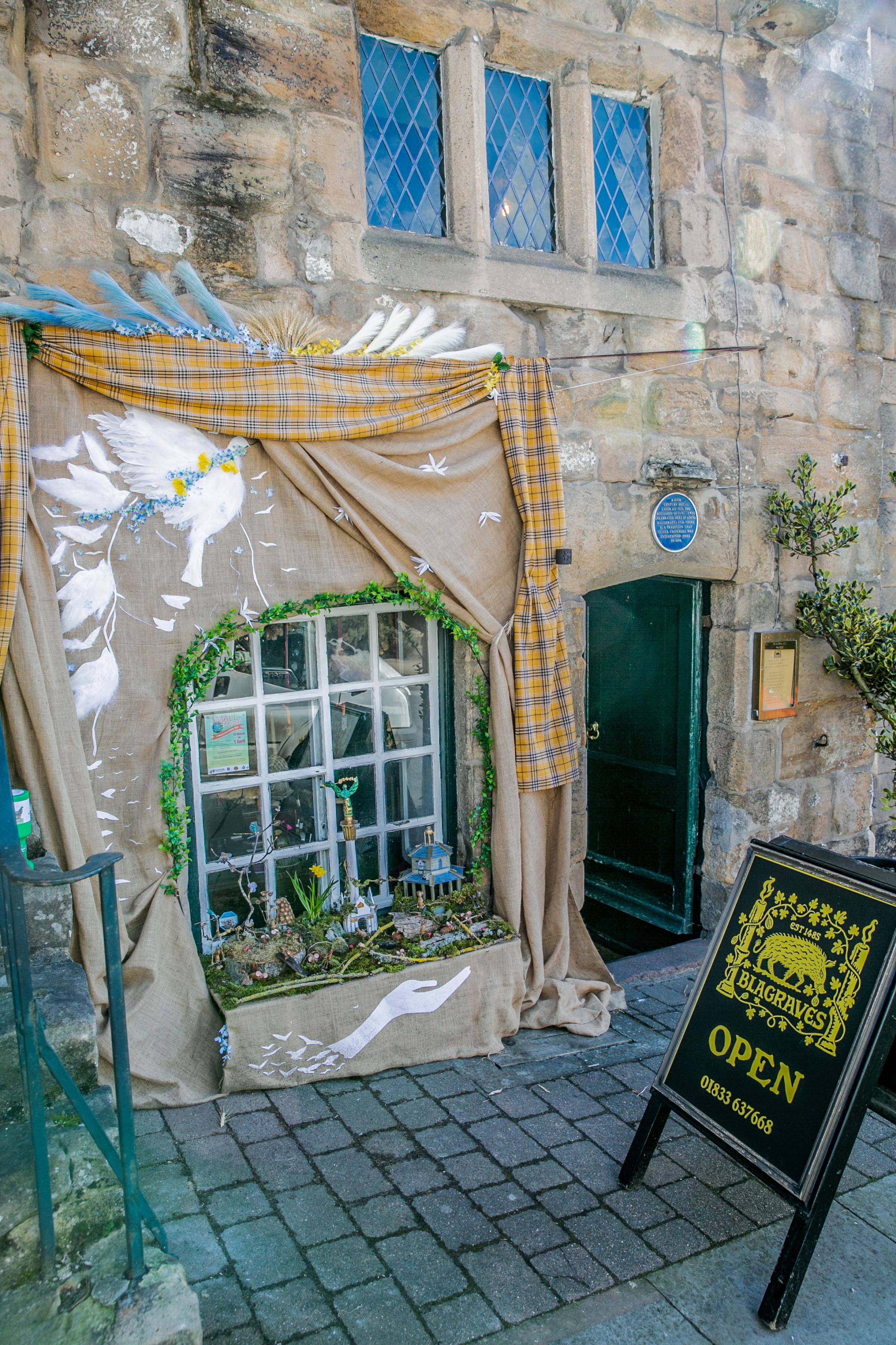 Shops in Barnard Castle have created window displays for the Small World festival Picture: SARAH CALDECOTT
