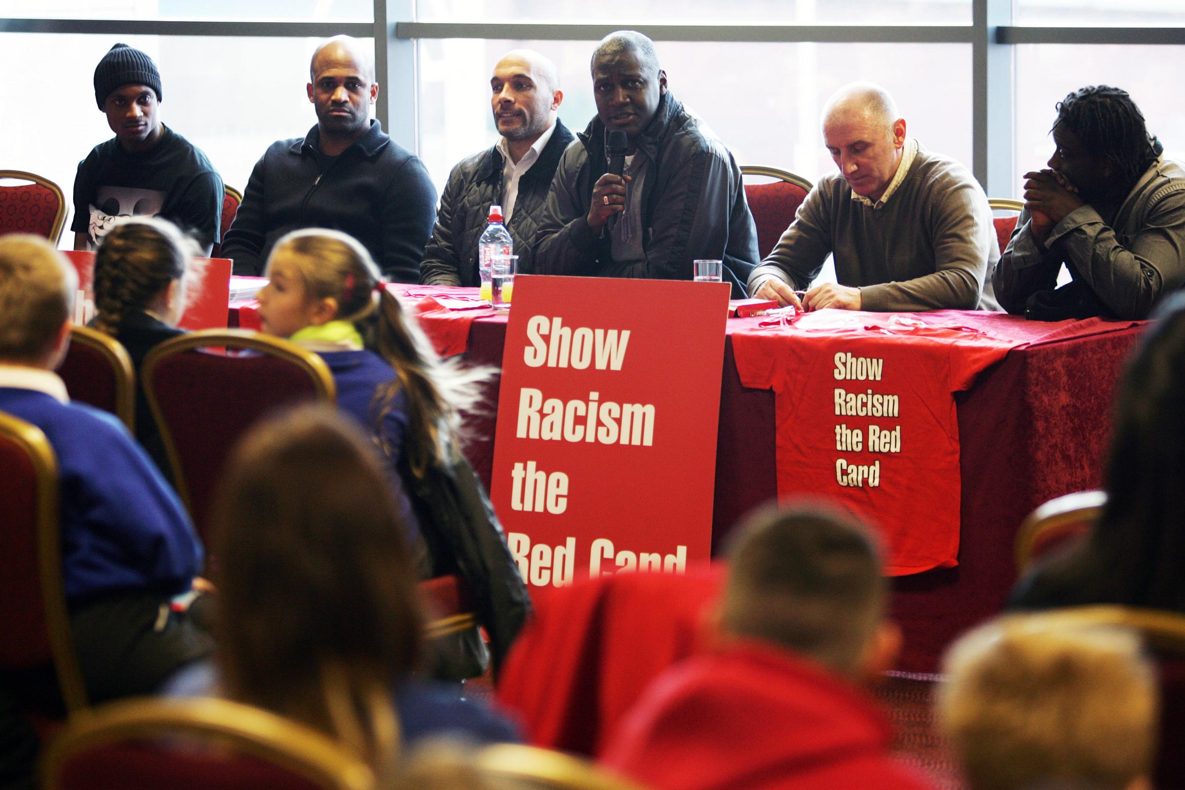 From left, pictured in 2010, Boro player Justin Hoyte and former pro football players Dean Gordon, Curtis Fleming, Gary Bennett, John Anderson and Olivier Bernard answer questions from local school children at a Show Racism the Red Card event at the