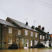 ROAD TORRENT: Flooding in the main street at Gilling West at the end of November