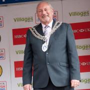 Dennis Teasdale wearing the Guisborough Town Council mayoral chain at a local event