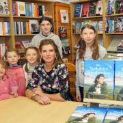 Amanda Owen shows her in the Bookshop with five of her children