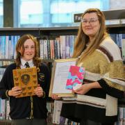 Stockton Children’s Book of the Year 2022 winner, Elle McNicoll, pictured with Best Book Review award winner, Tamsin, from Junction Farm Primary School