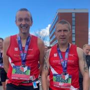 Paul Simpson and Paul Ellis at the end of the Manchester Marathon